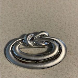 Don-Lin silver tone knot pin